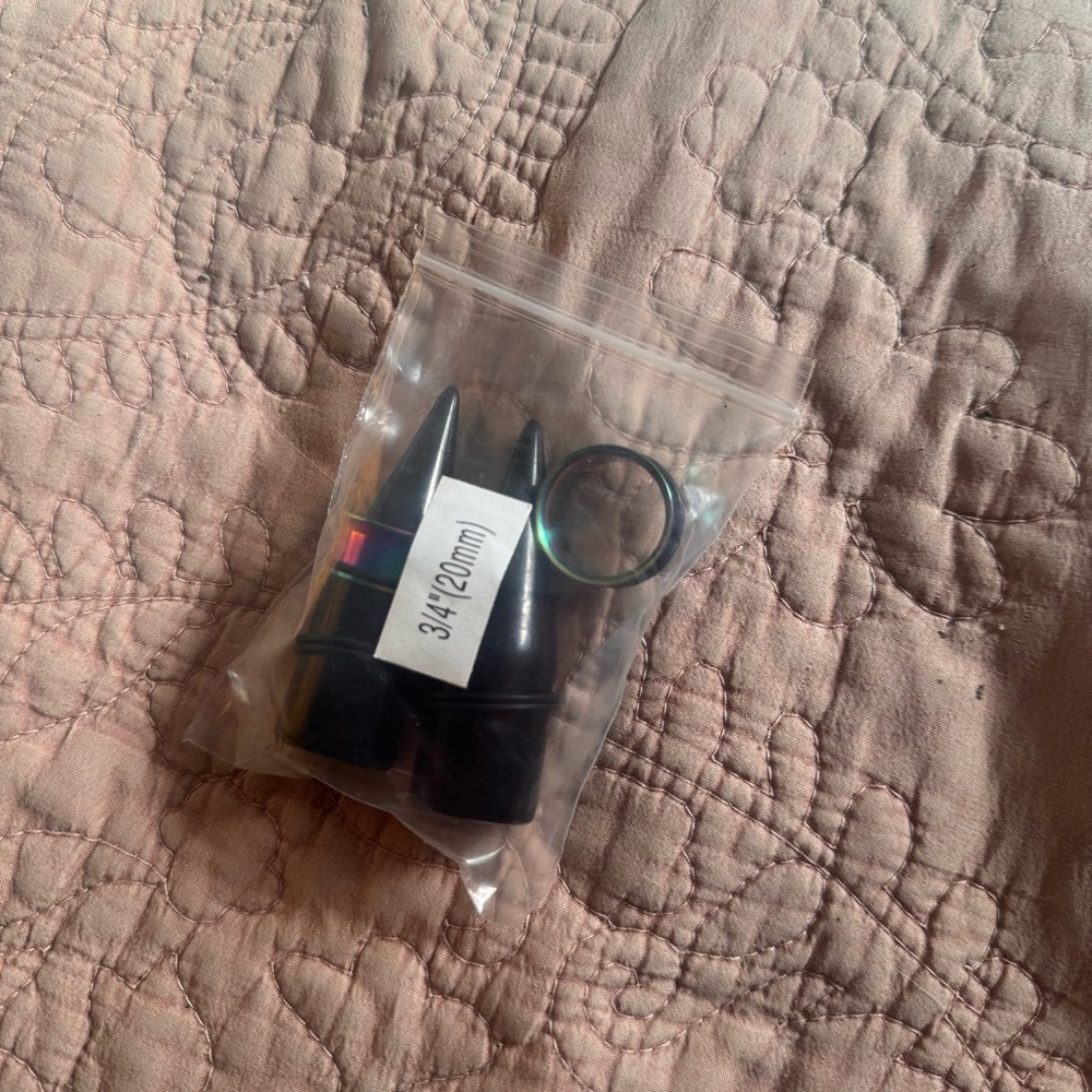 Black ear tapers and rainbow stainless steel Gauges with O-Rings